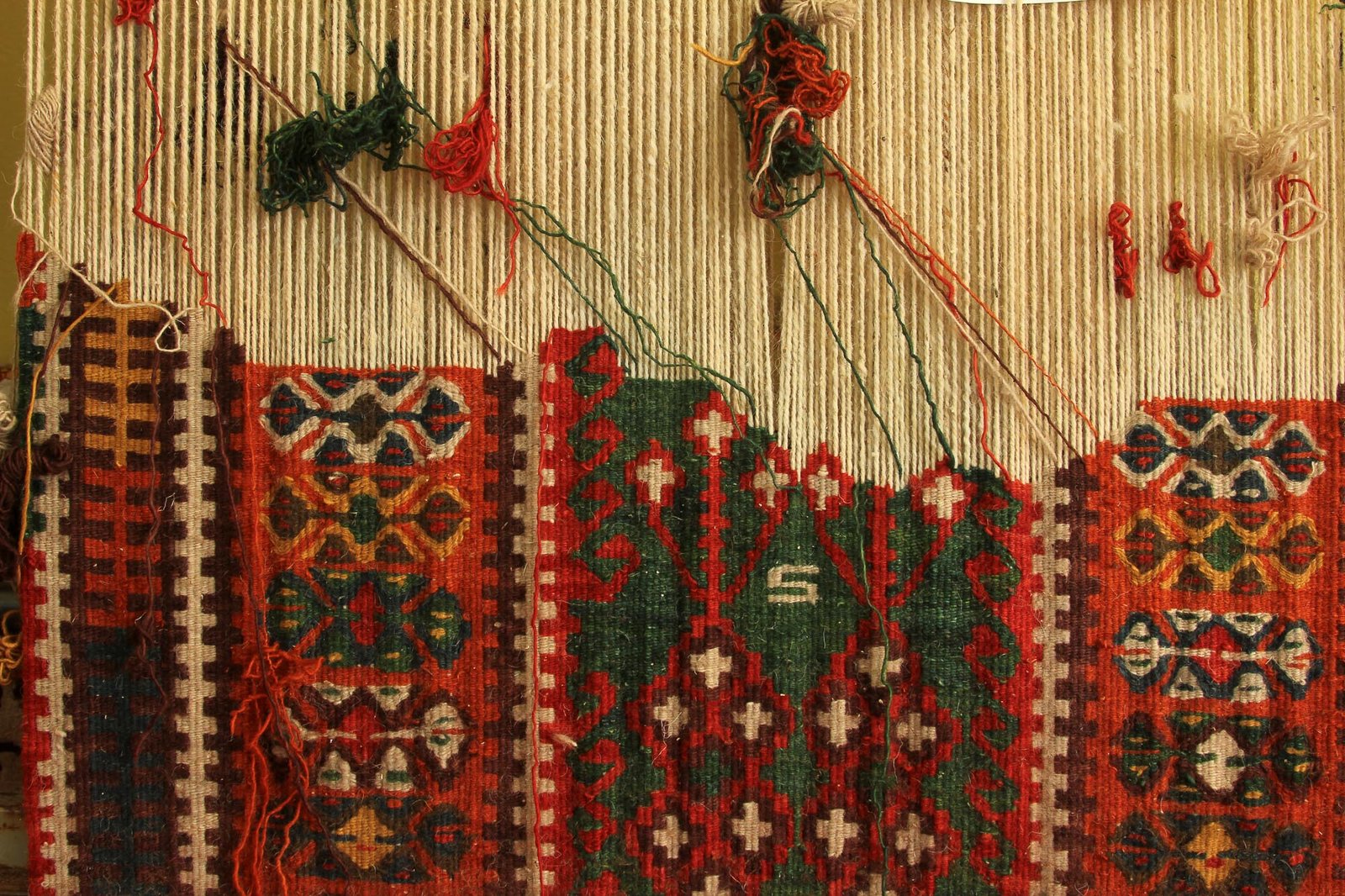 custom handmade carpet weaving in progress istockphoto
